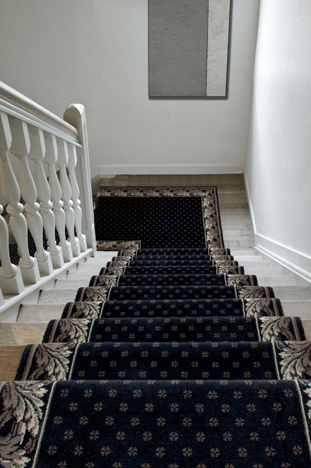 Stairs with a square tapered spindle and newel design