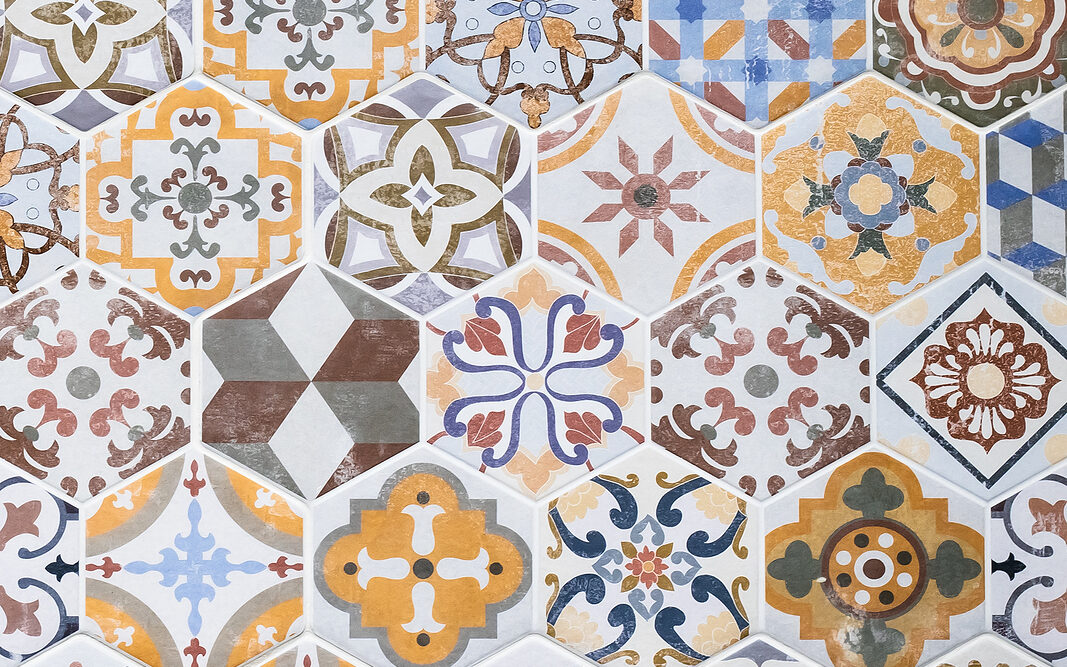 Mosaic ceramic tile, colorful wall texture, abstract pattern, design element. Vintage tile background. Azulejo ornament, floor surface. Tiled backdrop. Wallpaper. Painted tin-glazed ceramic tilework