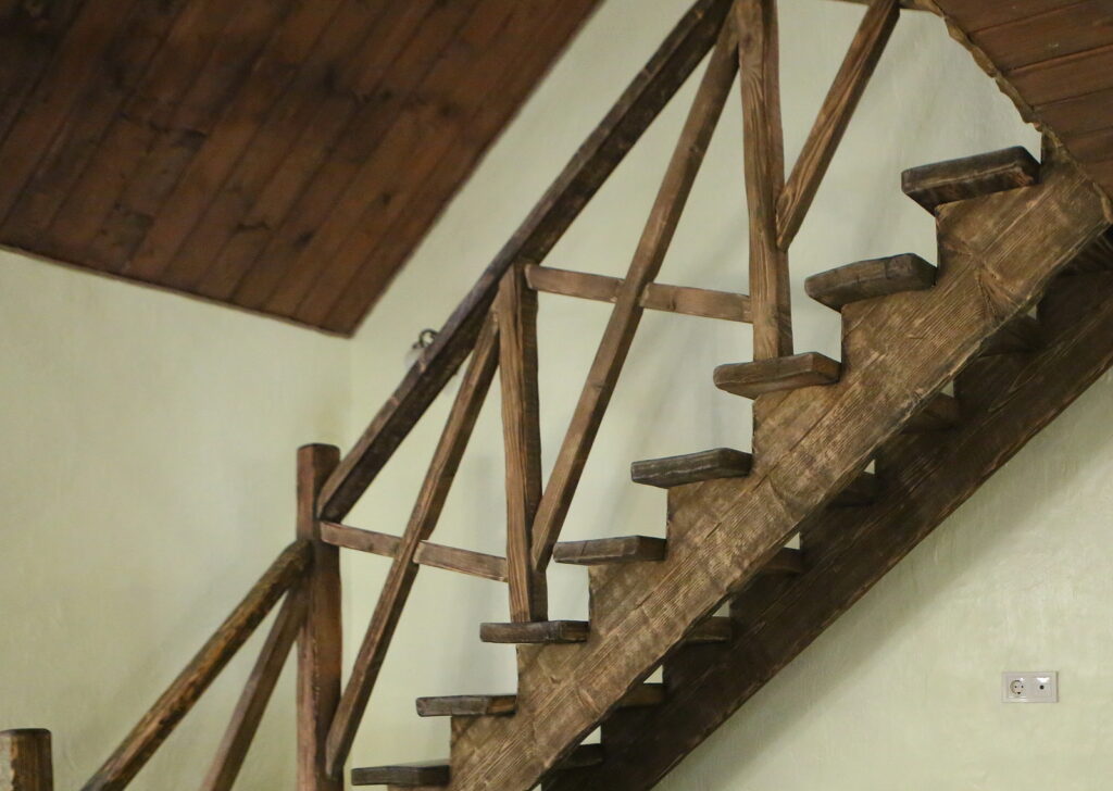 wooden staircase inside home interior cottage rustic style