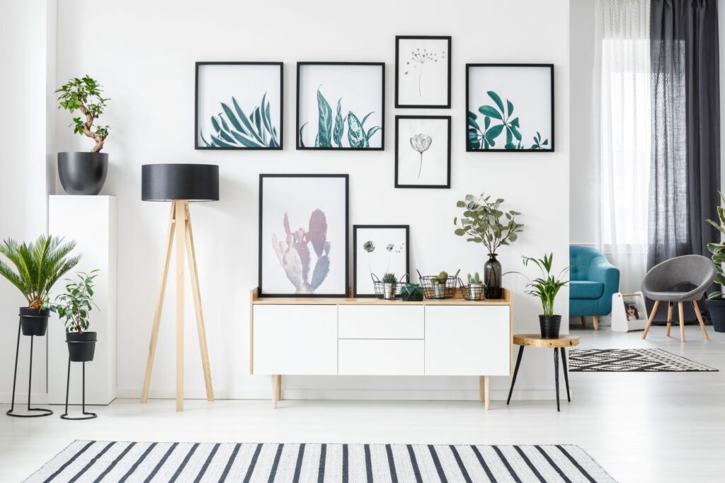 gallery wall of artwork in modern hallway 