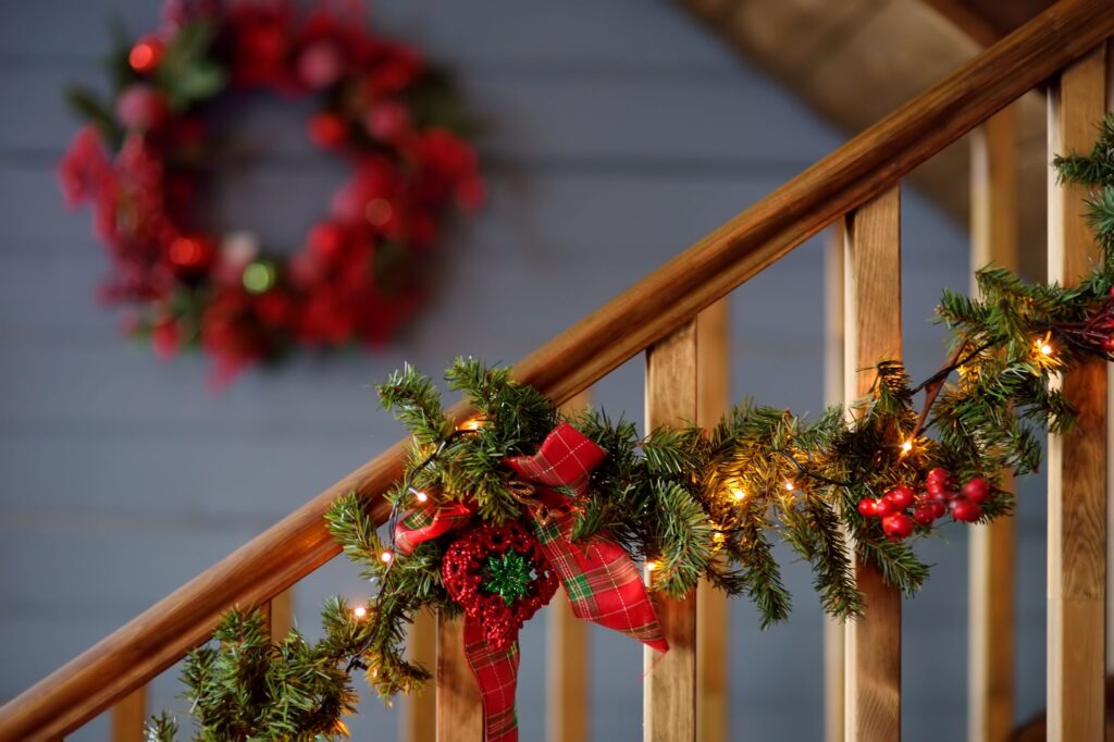 christmas garland swagged on staircase 